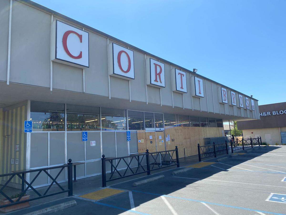 The Corti Brothers in East Sacramento parking lot sits empty Friday, June 26, 2020, as the store is closed after a coronavirus infection.