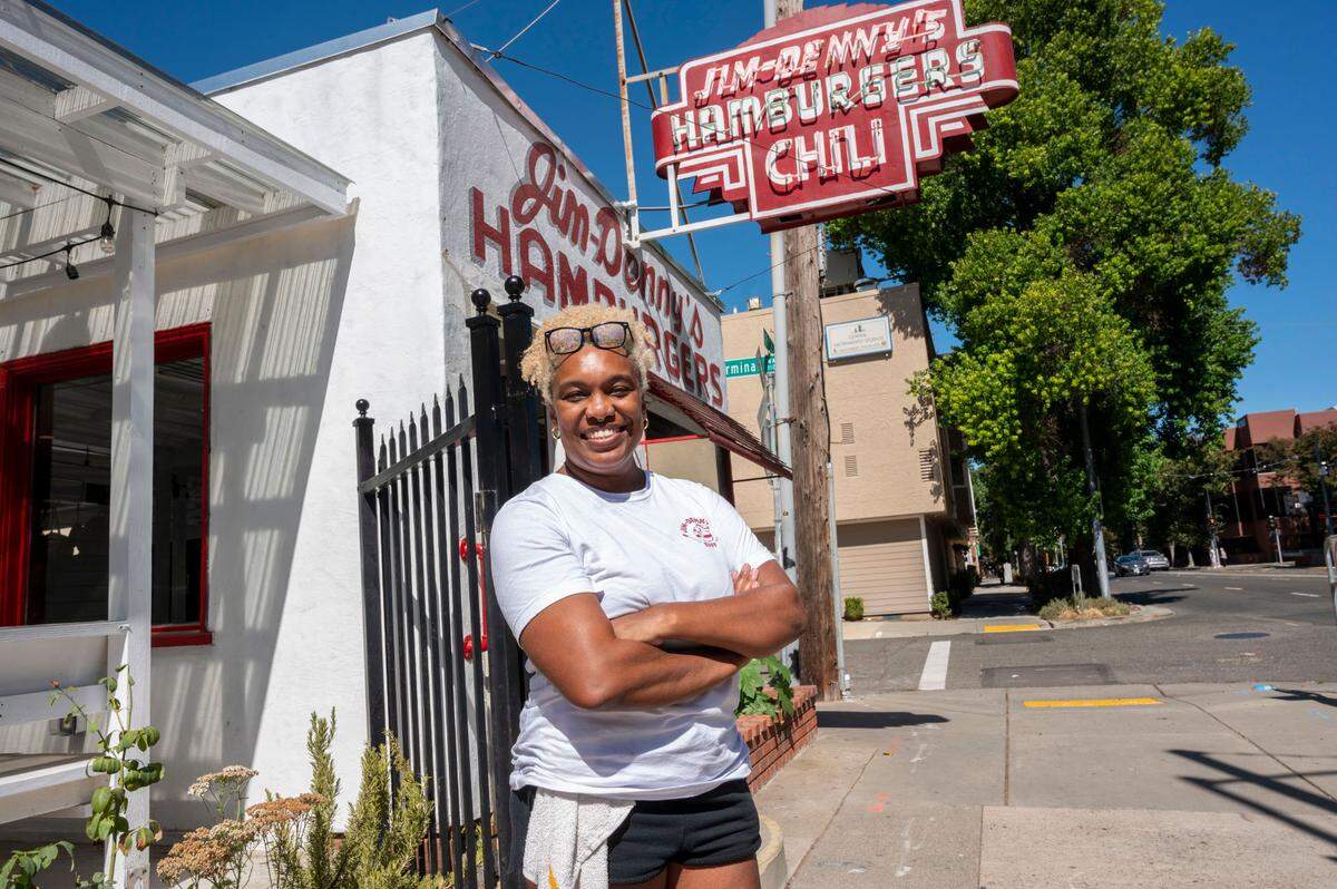 N’Gina Guyton stands in front of Sacramento’s landmark Jim-Denny’s on Sept. 27, 2023, weeks after she reopened the historic diner. On Tuesday, July 1, 2025, she announced the restaurant would close after she received an eviction notice from the building’s owner.