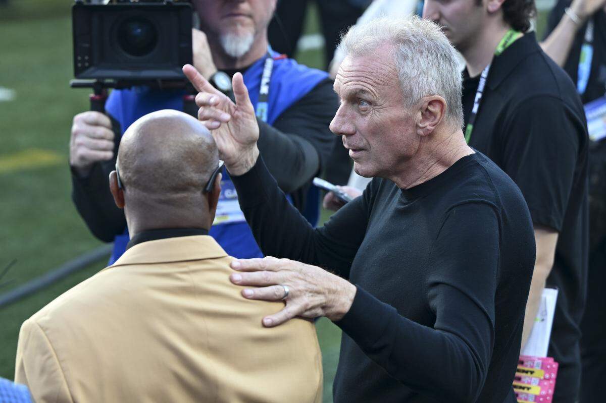 Joe Montana chats before the start of Super Bowl LX at Levi’s Stadium in Santa Clara on Sunday, Feb. 8, 2026.