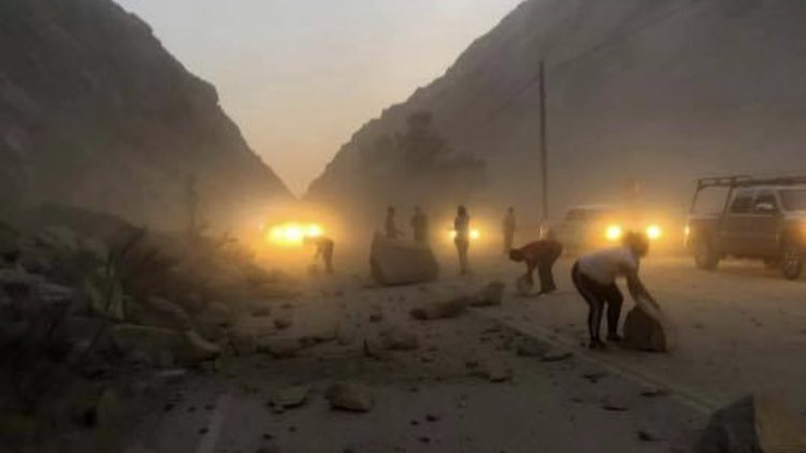 Rocks and debris are cleaned up on Highway 178 on Friday night at Kern Canyon. A magnitude 7.1 earthquake hit Ridgecrest a day after a 6.4 quake struck the area. It was felt hundreds of miles away, including in Sacramento and Phoenix.