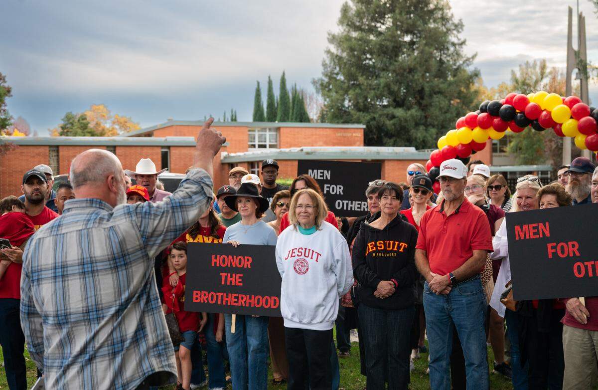 David Leatherby, a 1974 graduate and proprietor of Leatherby’s Family Creamery, speaks to a November rally against the proposal to allow girls to attend Jesuit High School in Carmichael. 