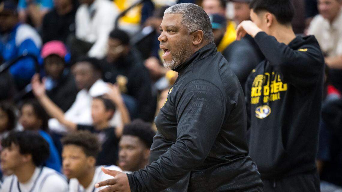 Inderkum Tigers coach Fred Wilson communicates with his players against Laguna Creek during a 2023 high school boys basketball CIF Sac-Joaquin Section playoff game.