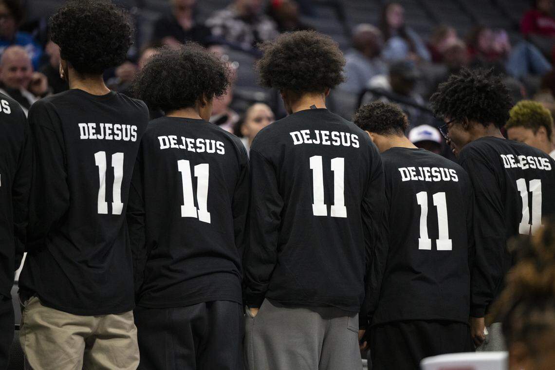 Christian Brothers boys basketball team wears jerseys honoring Jaden DeJesus-Eves while watching the CIF Sac-Joaquin Section Division II girls basketball championship at Golden 1 Center in Sacramento on Friday. DeJesus died days before. 