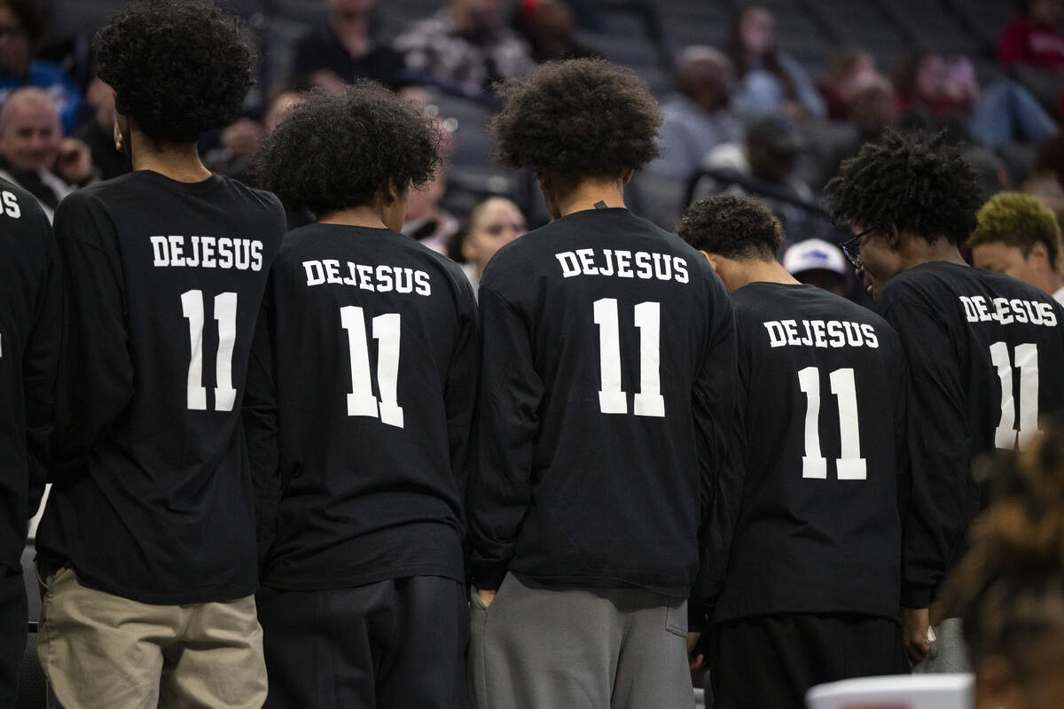 Christian Brothers boys basketball team wears jerseys honoring Jaden DeJesus-Eves while watching the CIF Sac-Joaquin Section Division II girls basketball championship at Golden 1 Center in Sacramento on Friday. DeJesus died days before.