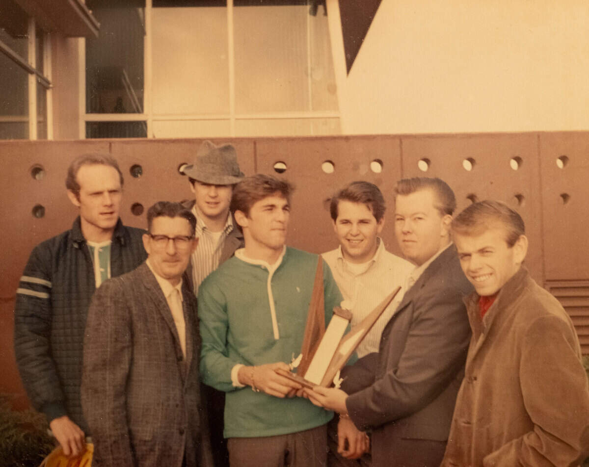Fred Vail, second from right, joins The Beach Boys at Sacramento Municipal Airport on Dec. 22, 1963, before a concert at Memorial Auditorium in Sacramento. From left, Mike Love, Chase Sanborn, Brian Wilson, Dennis Wilson, Carl Wilson, Fred Vail and Al Jardine.