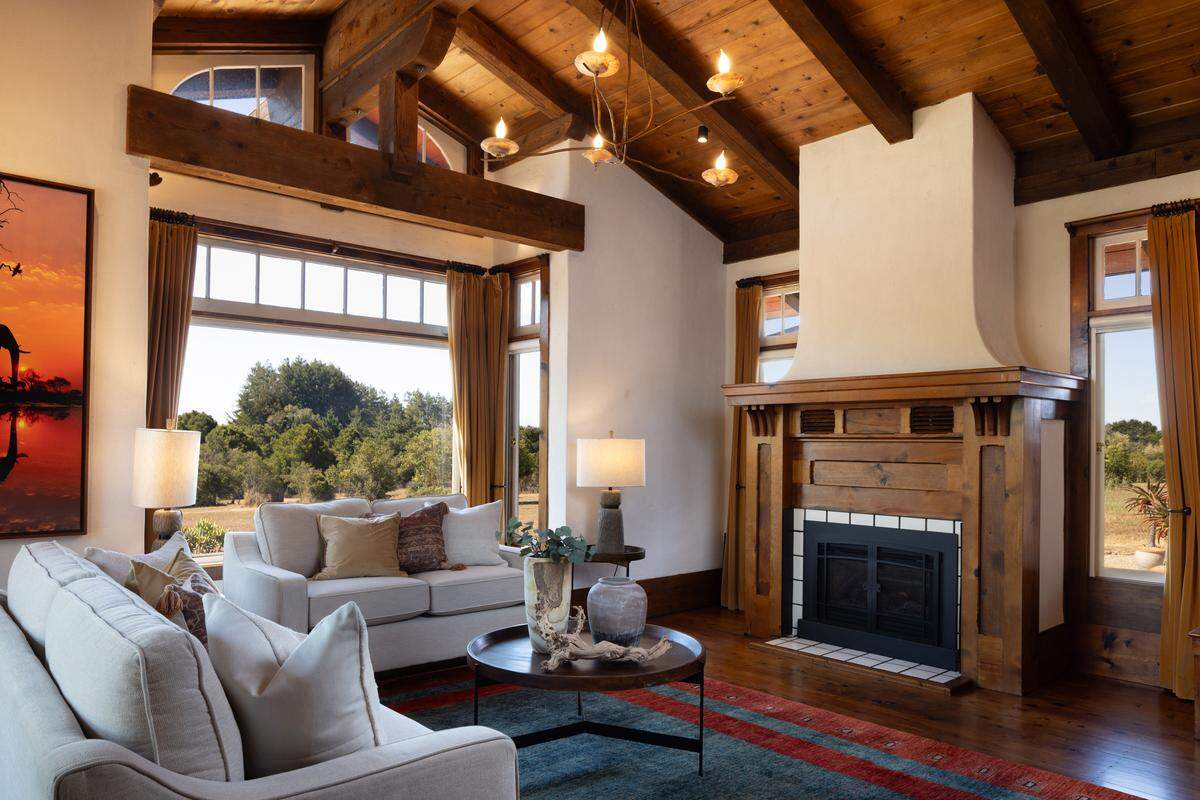 The Santa Cruz residence has two bedrooms and two bathrooms, century-old redwood beams, Douglas fir, maple and copper accents and stained pine flooring throughout.