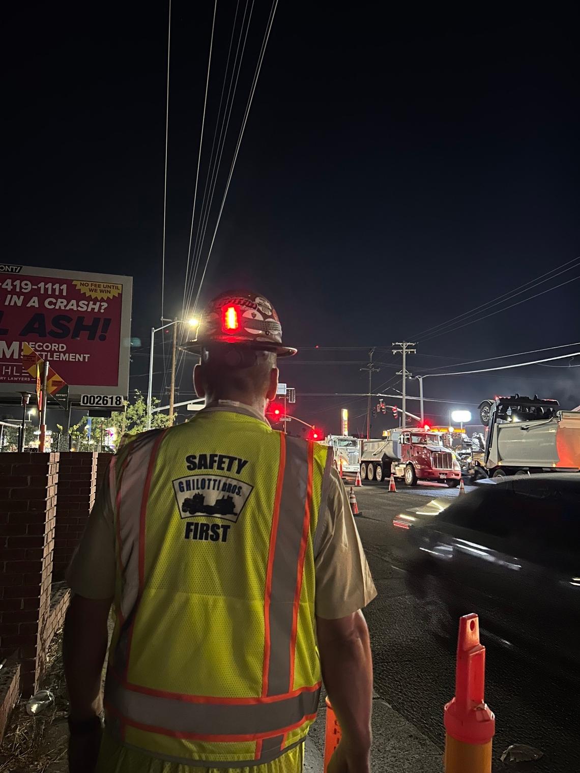 Brandt Maurice, paving manager and highway construction veteran, wears a hard hat with lights in front and back, as well as a vest. Still, he says, gear can can only do so much when it comes to the unpredictability of speeding cars.