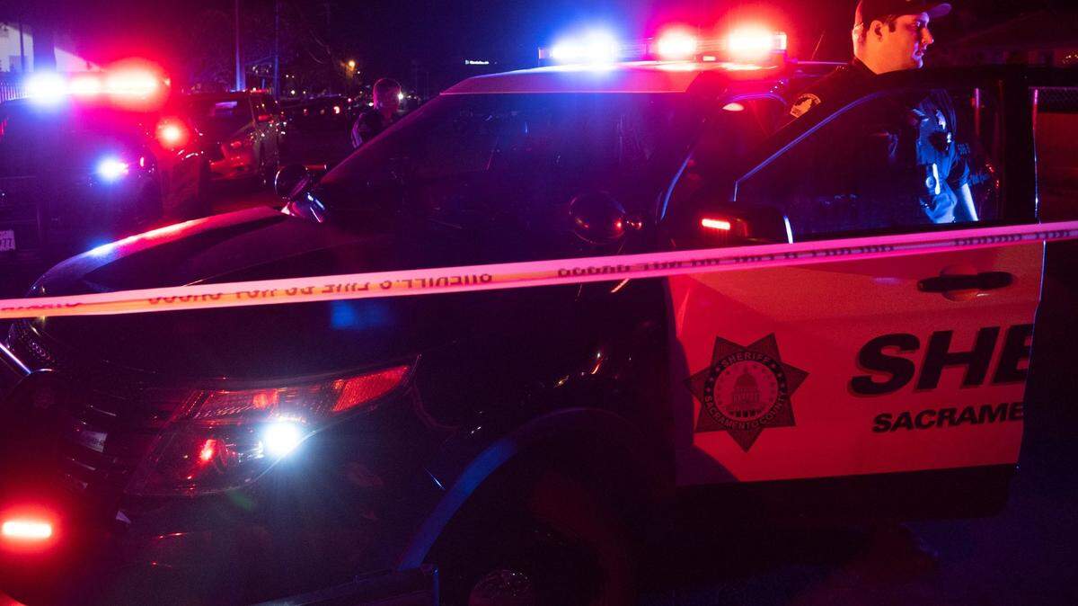 Police investigate a crime scene in Sacramento County in February. The Sacramento County Sheriff’s Office overuses traffic stops, disproportionately harming Black drivers, communities of color, researchers for the ACLU found.