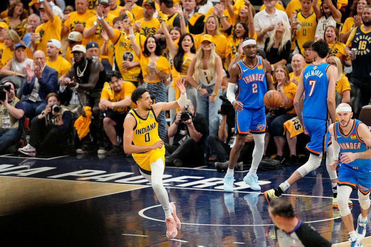 Indiana Pacers guard Tyrese Haliburton (0) reacts after a play against the Oklahoma City Thunder in Game 6 of the 2025 NBA Finals on Thursday in Indianapolis.
