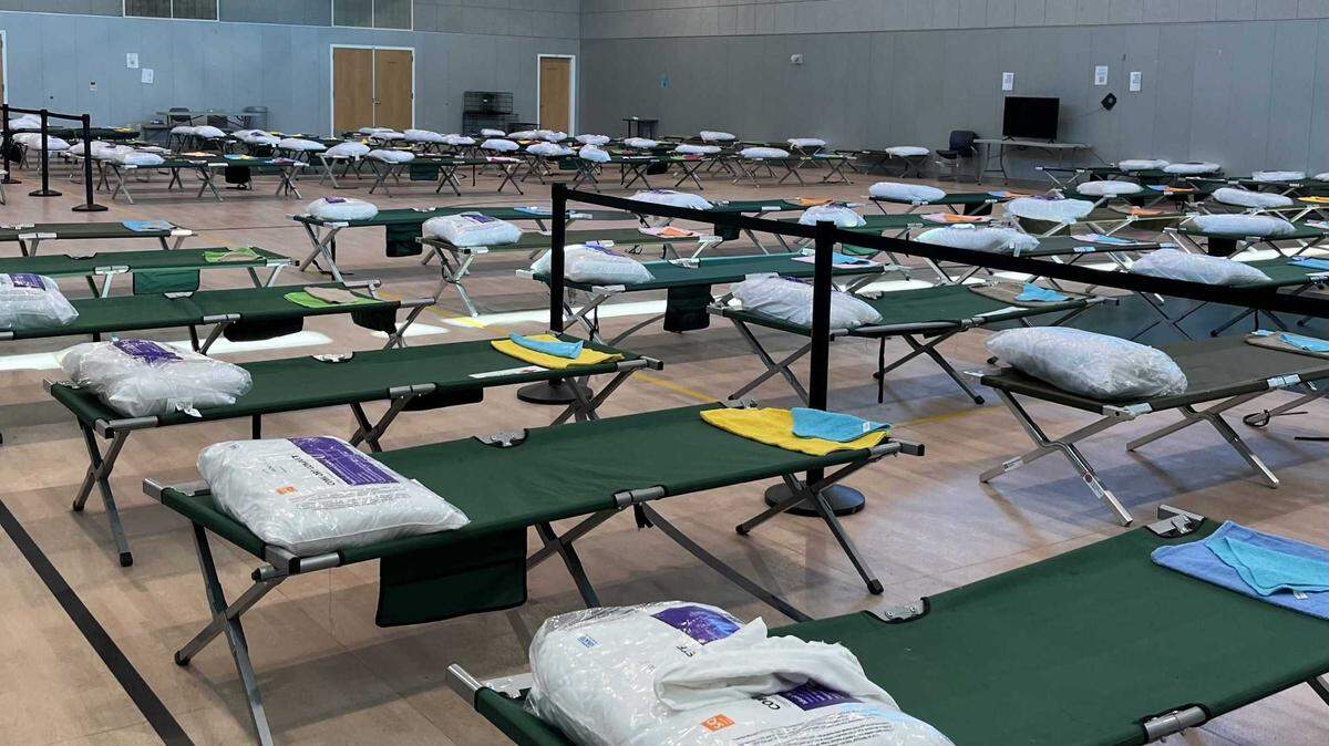 Rows of cots, towels and blankets at the Warren E. Thornton Youth Center for a winter respite on November 7, 2024. Sacramento County will use the space as a cooling center for homeless residents on Thursday, July 10, and Friday, July 11, 2025.