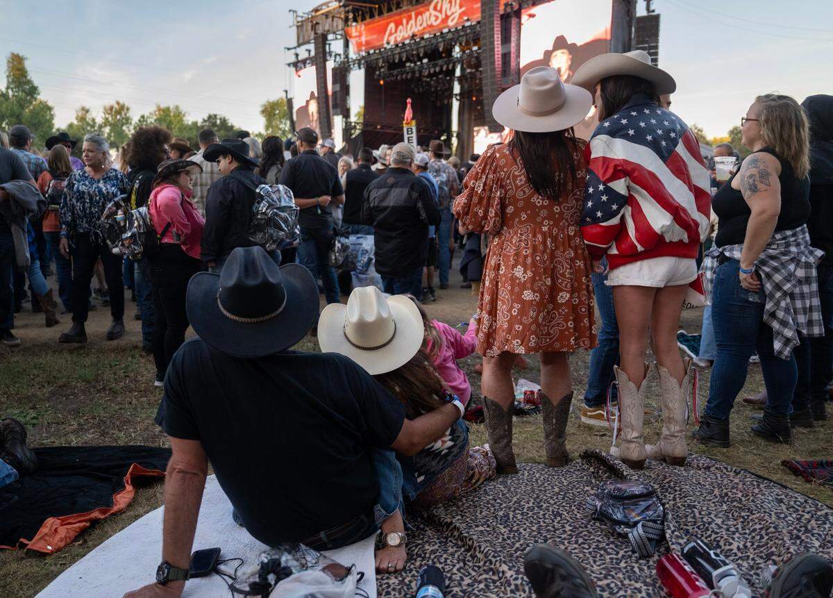 John and Tammy Mosa, Brooke Toste and Lisa Stephenson of Arroyo Grande listen to Clint Black perform during the GoldenSky Country Music Festival at Discovery Park in Sacramento on Friday, Oct. 18, 2024.