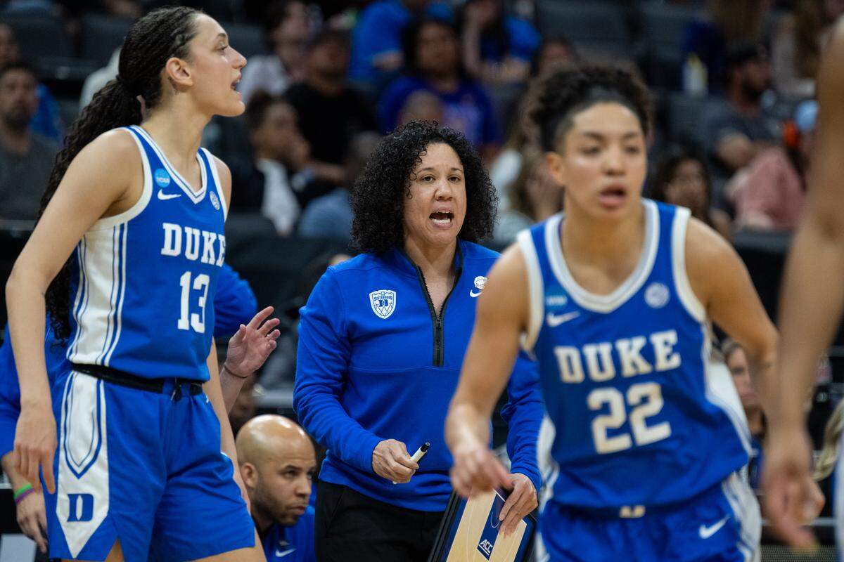 Duke Blue Devils head coach Kara Lawson talks to players during the NCAA Women’s Basketball Tournament Sweet 16 game against the Louisiana State University Tigers at Golden 1 Center in Sacramento on Friday.