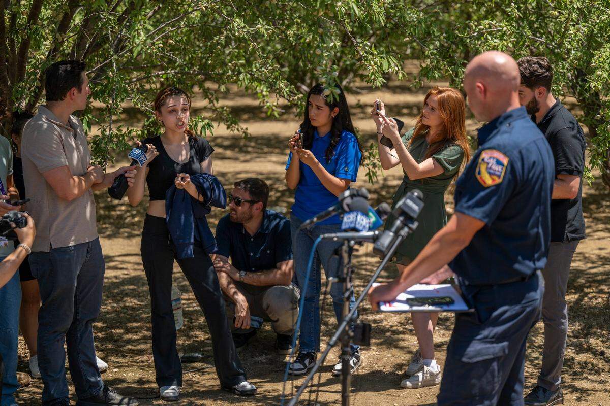 Syanna Ruiz, 18, whose boyfriend Jesus Ramos is missing, confronts Cal Fire Public Information Officer Jason Clay about the lack of transparency during a news conference on Wednesday, July 2, 2025, about an explosion at pyrotechnics facility in Esparto the previous night. Seven people are missing after the incident.