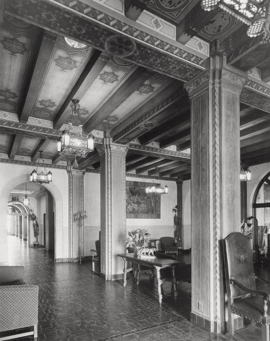 The lobby of the Norconian Club in Norco, Calif., photographed soon after its 1929 opening, featured Spanish colonial style architecture with a decorative wood beam ceiling. The hotel casino resort closed during the Great Depression and was purchased by the U.S. Navy to serve as a hospital during World War II. It was given to the state of California in the 1960s to serve as a prison.