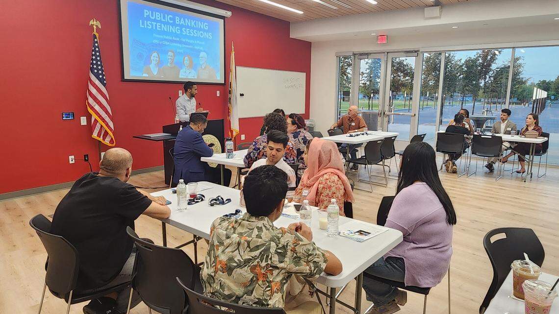A representative from End Poverty in California explains the concept of a public bank at a Sept. 25 meeting.