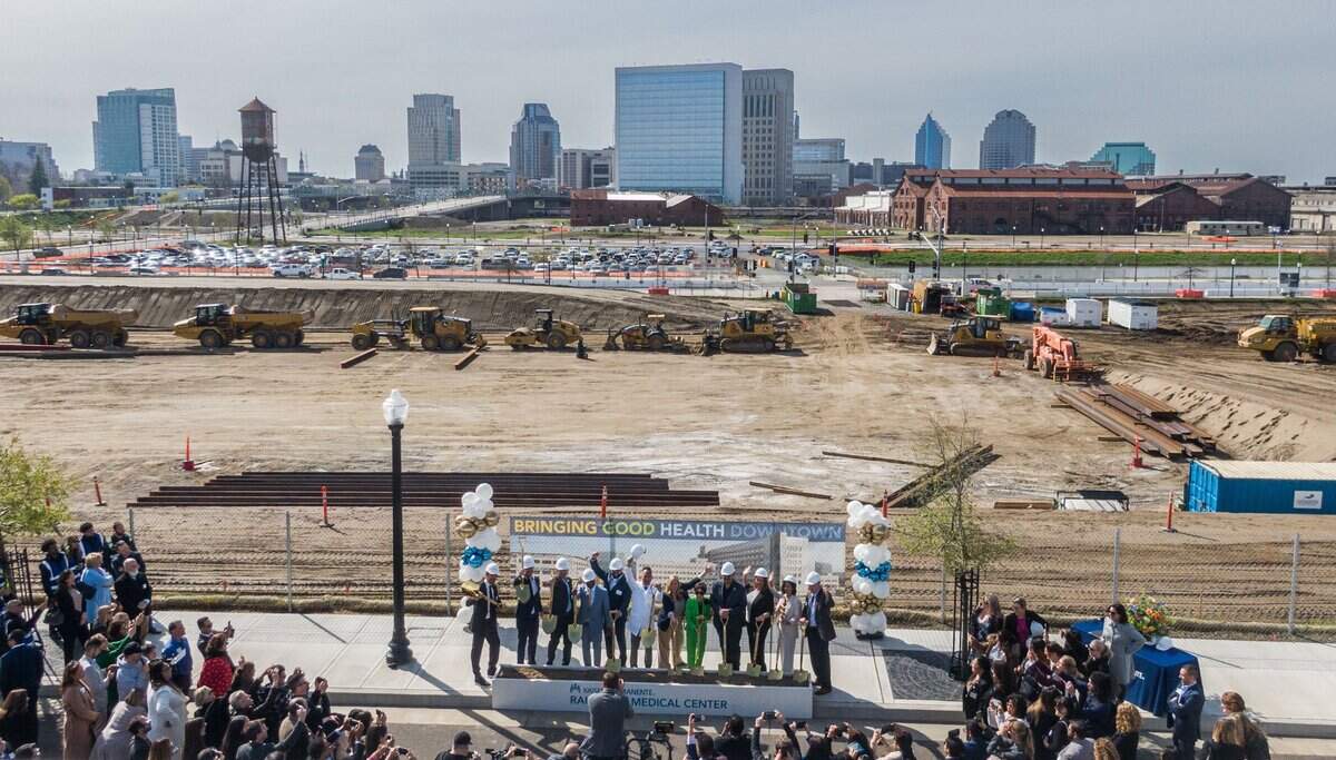 Speakers and dignitaries participate in the groundbreaking for the new Kaiser Permanente Railyards Medical Center on Wednesday. The new facility will feature an eight-story hospital and a five-story medical office building.