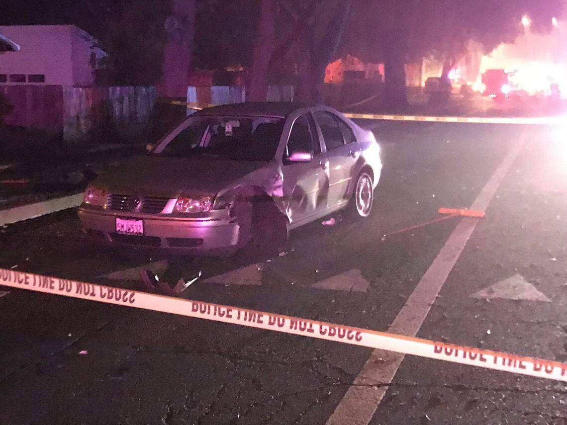 A crashed car sits near the scene where a police officer was shot in Davis on Thursday evening, Jan. 10, 2019.