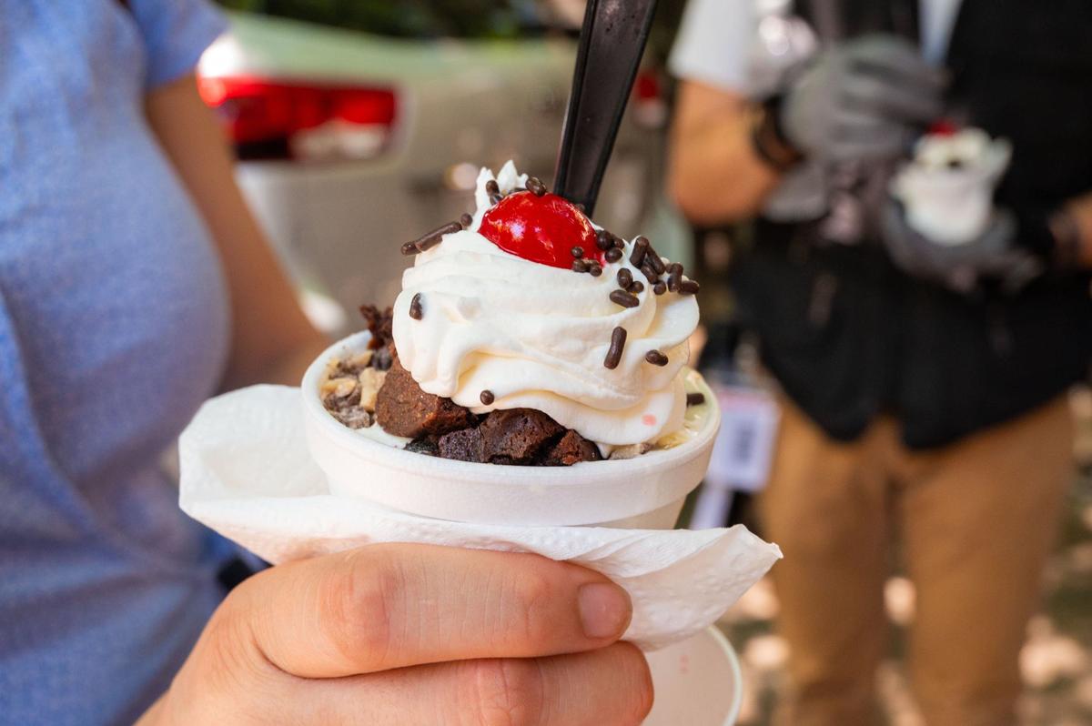 An ice cream sundae topped with brownies and whipped cream is available at Build A Sundae in the California State Fair.