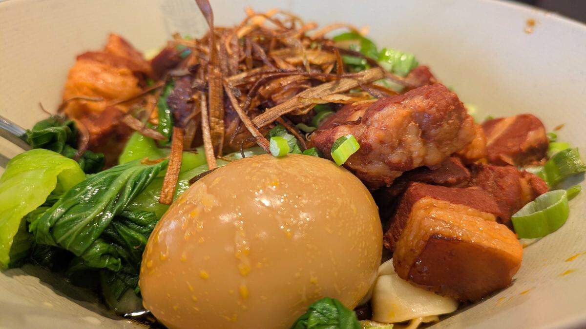 Pork belly noodles at Highland Noodles in Roseville include made-to-order hand-pulled noodles, grilled pork belly cubes, bok choy and a whole boiled egg.