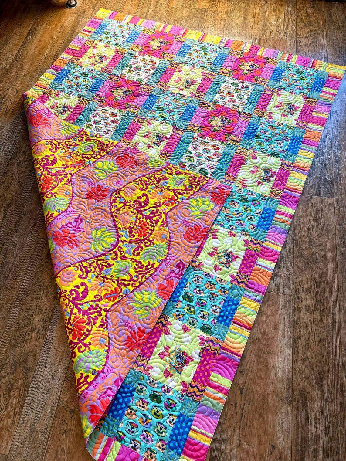 The author’s lap quilt, an exercise of her love of bright colors using a pattern from the now defunct magazine Simply Moderne.