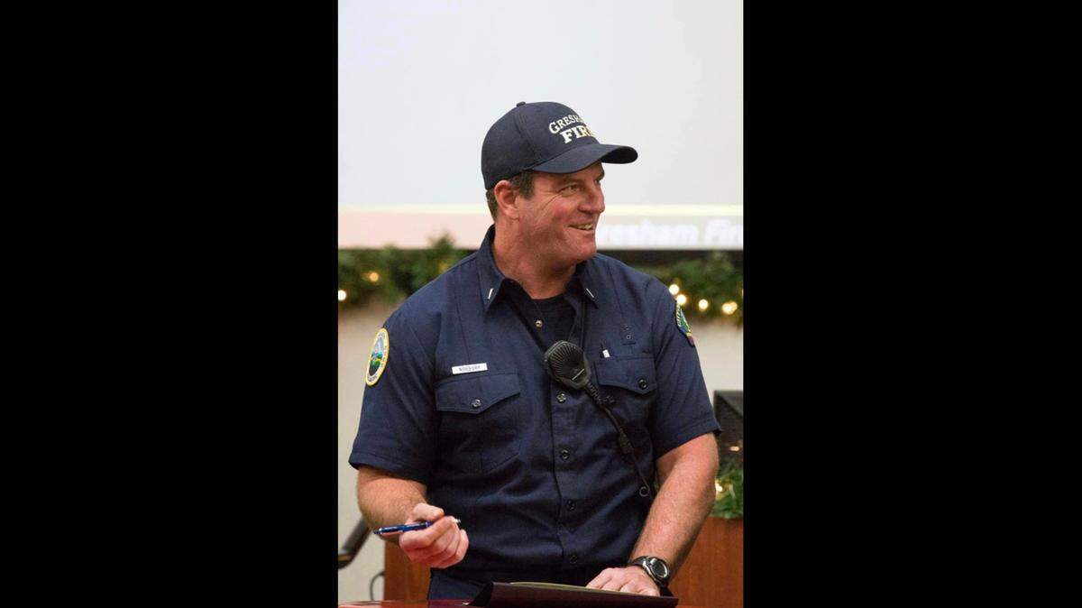 A firefighter and former Navy SEAL died from a medical emergency during a training exercise, an Oregon city says.