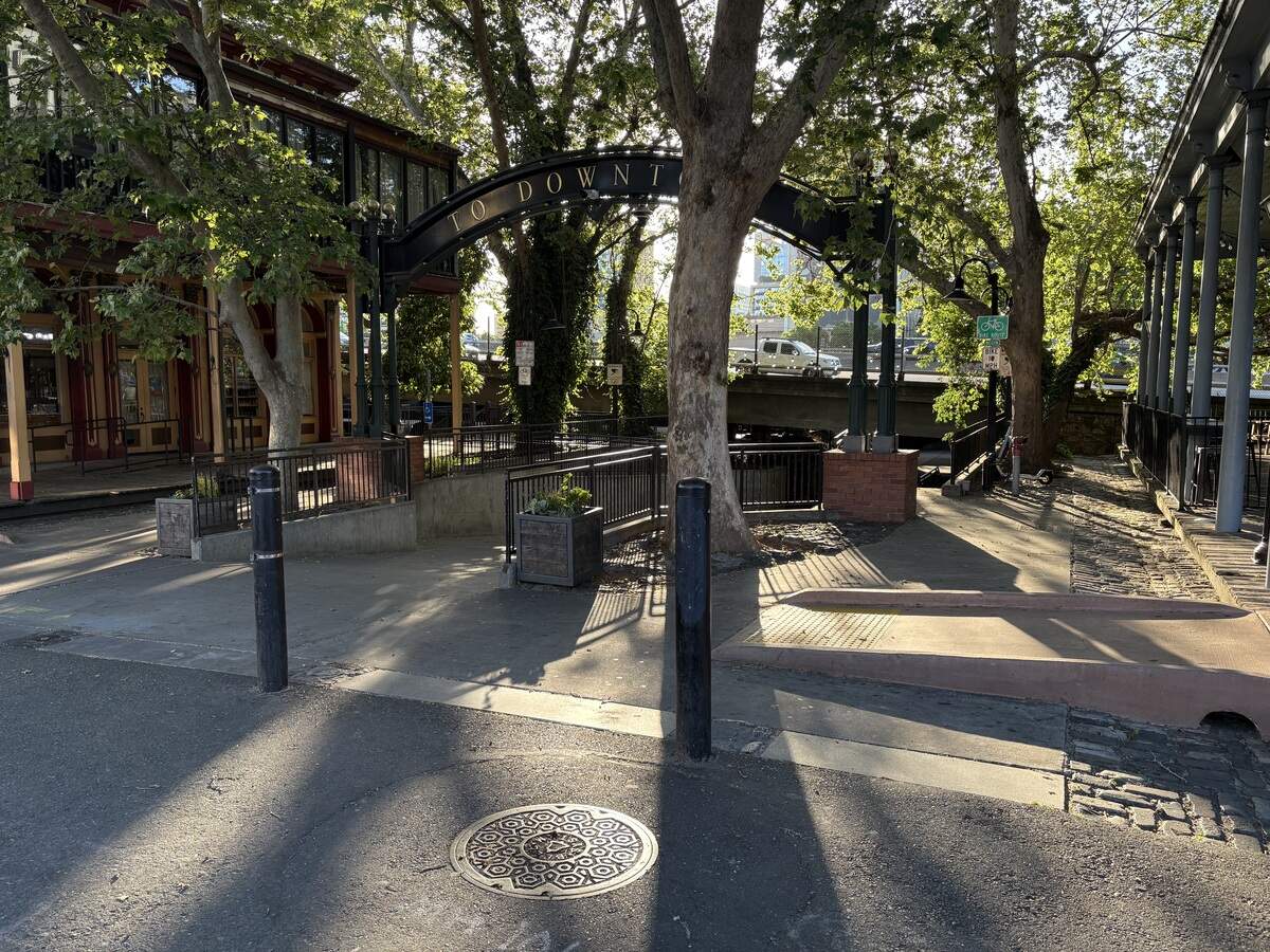 An archway marks the Old Sacramento entrance to the tunnel under Interstate 5 that follows the old alignment of K Street to Downtown Commons. The city of Sacramento is considering installing a plaque to honor Hackett House, a Black-owned hotel which once stood nearby.