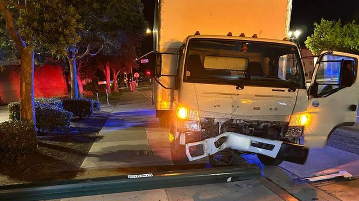A delivery driver intentionally crashed into a light pole in Watsonville to escape an accused armed robber, California police say.
