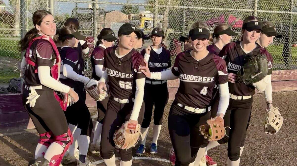The Woodcreek Timberwolves softball team takes the field before a home game against Roseville on March 31.