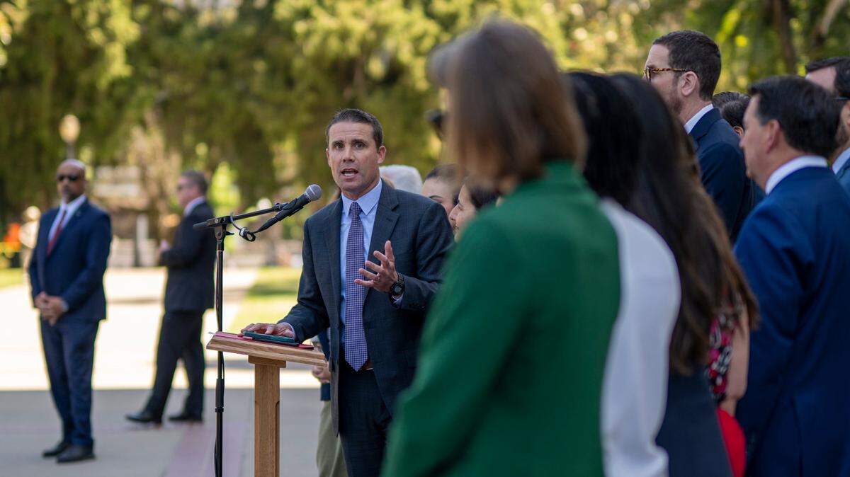 Senate President pro Tem Mike McGuire, D-Santa Rosa, and members of the California Senate deliver remarks on the west steps of the state Capitol on Friday in solidarity with ongoing protests in Los Angeles.