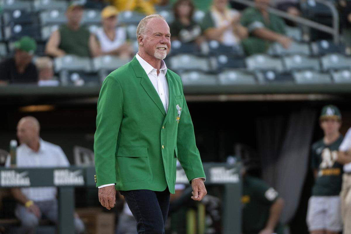 Athletics Hall of Famer Mark McGwire is introduced during a pregame ceremony game at Sutter Health Park on Saturday in West Sacramento. Barry Zito, Mark Mulder, Tim Hudson and Monte Moore were induced into the Athletics Hall of Fame.