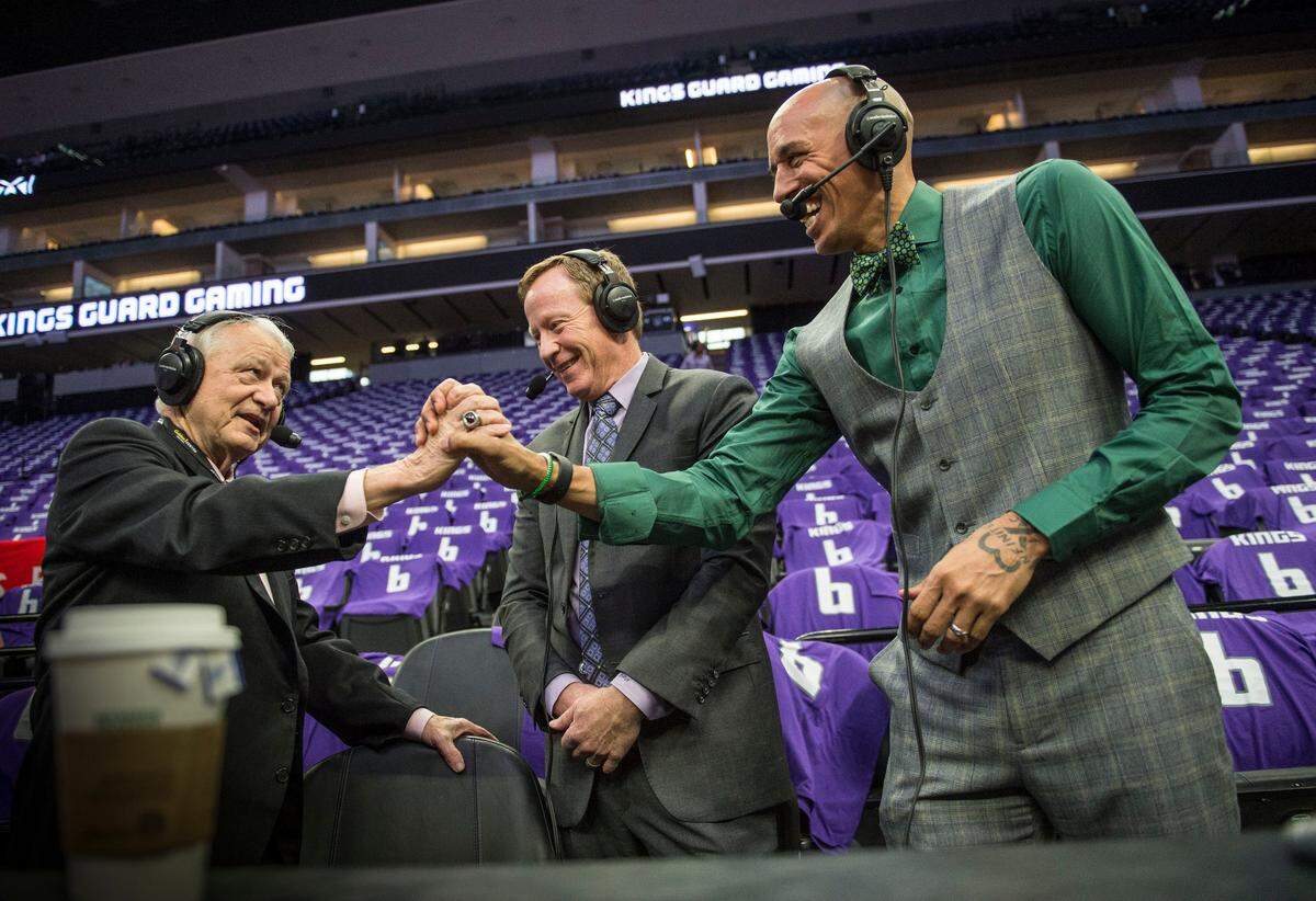 Jerry Reynolds, left, greets former Kings’ player Doug Christie on April 11, 2018, before their final game of the season at Golden 1 Center. Christie replaced Reynolds as the team’s color analyst and joined play-by-play announcer Grant Napear, center, on NBC Sports California.