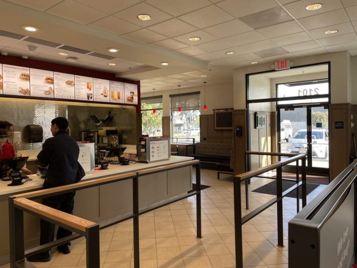 A customer orders food at Chick-fil-A on Tuesday, Feb. 20, 2024, at 2101 Alta Arden Expressway. The fast-casual chain reopened its only location in Arden Arcade after six months of reconstruction with a new drive-thru lane, an expanded kitchen and new flooring.