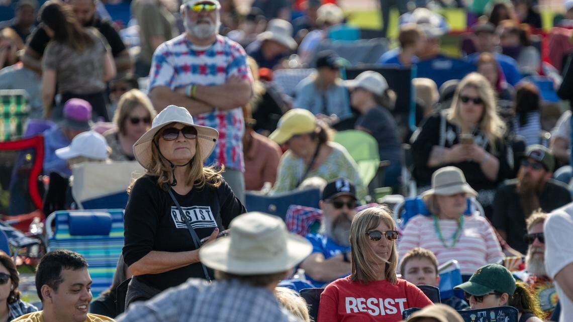 Supporters wear T-shirts featuring the word “resist” before Bernie Sanders speaks during the Fighting Oligarchy rally at Folsom Lake College on Tuesday, April 15, 2025.