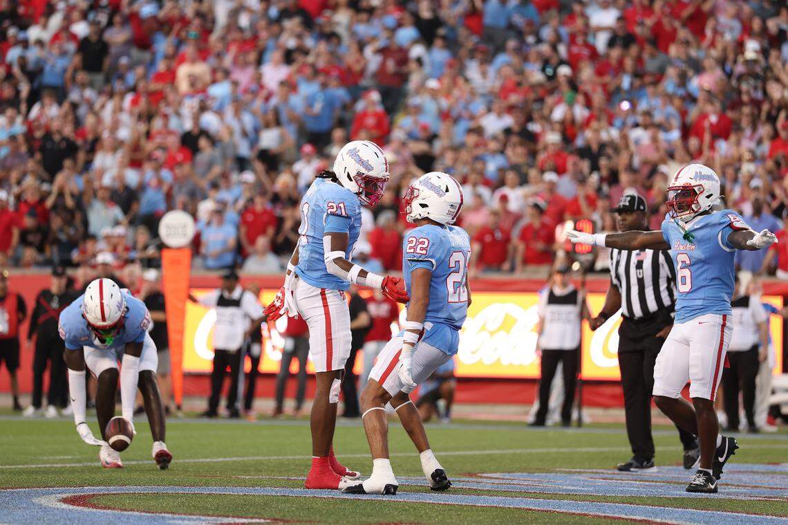 Zelmar Vedder (21) and Marc Stampley II (22) of the Houston Cougars react while playing against the Texas Tech Red Raiders on Oct. 4 in Houston, Texas.