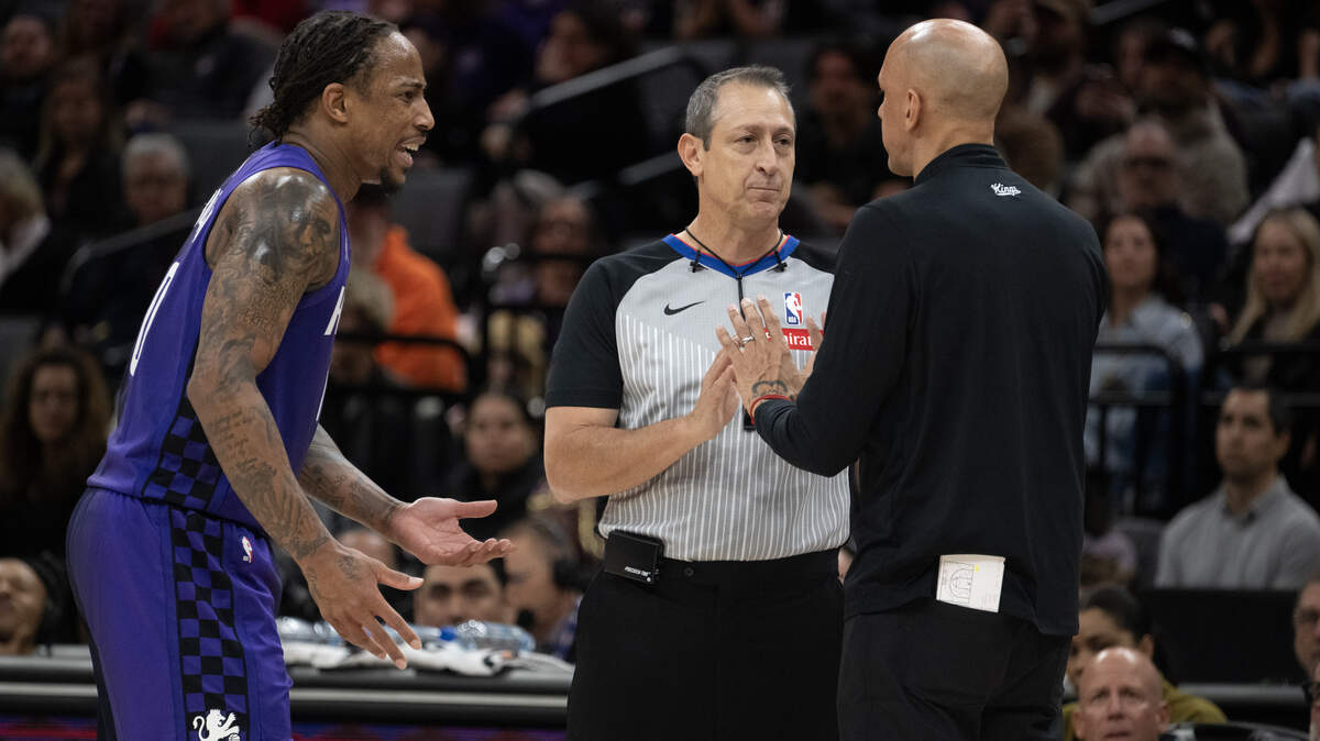 Sacramento Kings forward DeMar DeRozan (10) and head coach Doug Christie argue with referee JT Orr after DeRozan was called for a technical foul in the second half on Tuesday at Golden 1 Center in Sacramento.