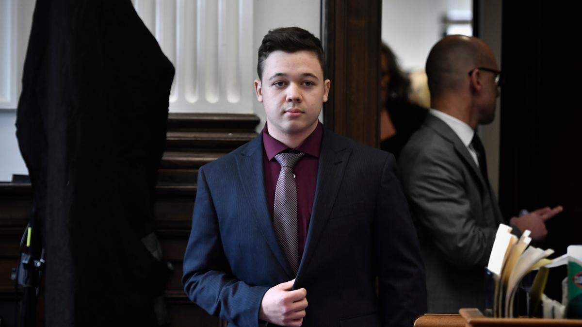 Kyle Rittenhouse enters the courtroom to hear the verdicts in his trial at the Kenosha County Courthouse in Kenosha, Wis., on Friday, Nov. 19, 2021. Rittenhouse has been acquitted of all charges after pleading self-defense in the deadly Kenosha shootings that became a flashpoint in the nation’s debate over guns, vigilantism and racial injustice. The jury came back with its verdict afer close to 3 1/2 days of deliberation. (Sean Krajacic/The Kenosha News via AP, Pool)