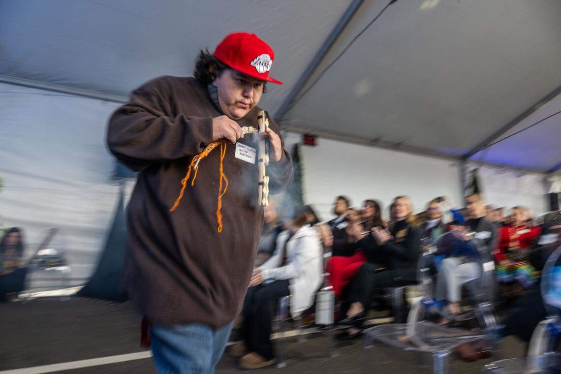 Jammy Olvera, with the Wilton Rancheria, helps with the blessing of the land during the groundbreaking for the new Kaiser Permanence Railyards Medical Center on Wednesday.