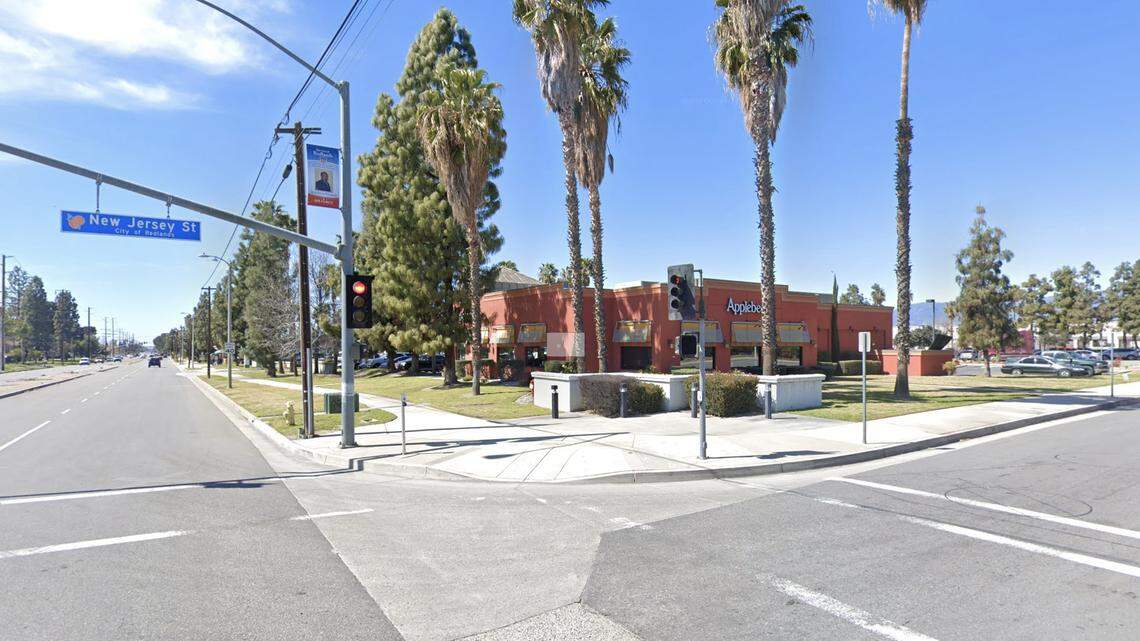 An officer in Redlands, California, opened fire inside a busy Applebee’s after a man he had chased into the restaurant pointed a gun at him, police say.