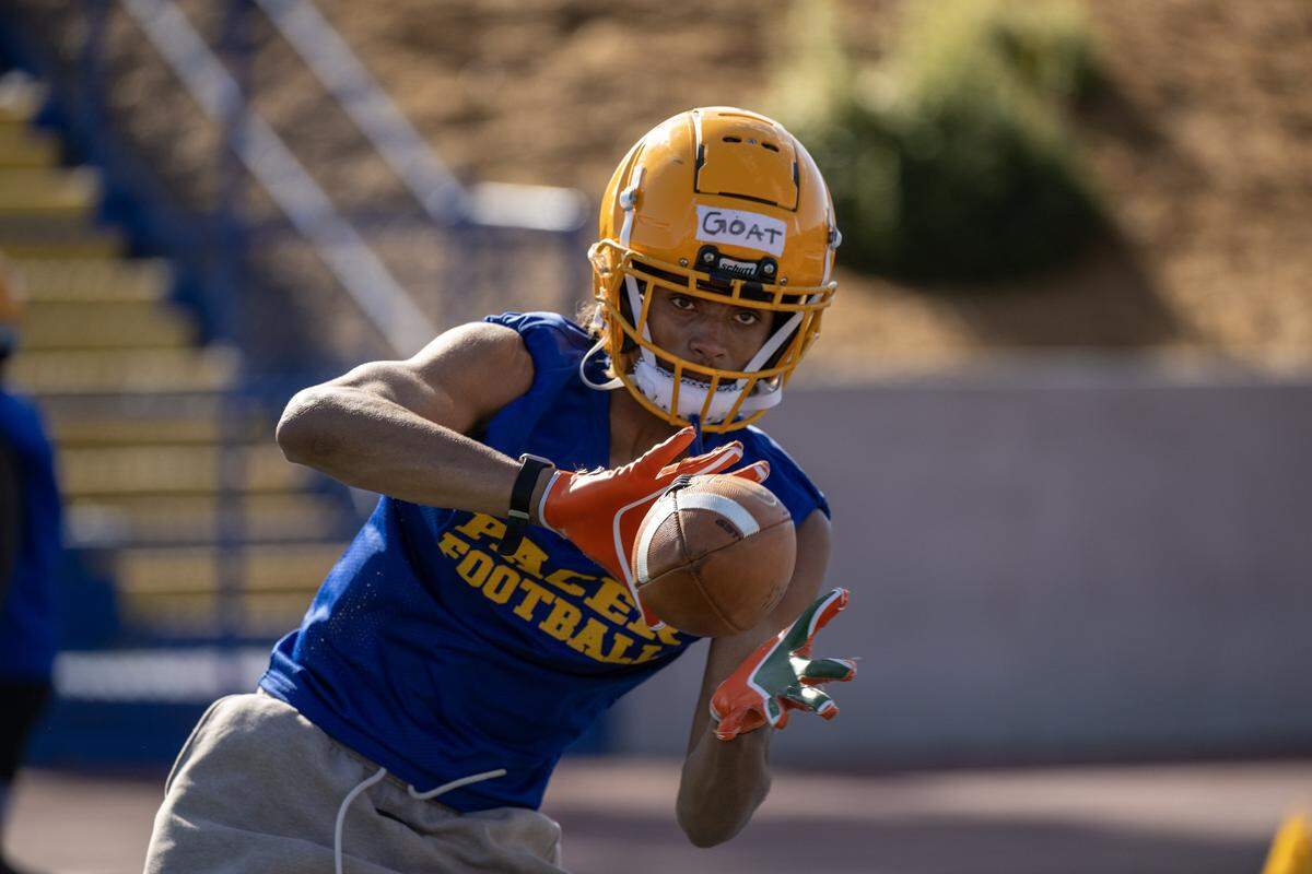 Grant Pacers tight end Zo Edwards catches a pass during practice on campus in Del Paso Heights on Tuesday.