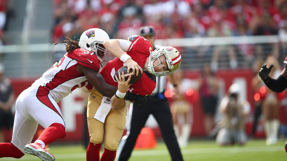Arizona Cardinals linebacker Josh Bynes sacks 49ers quarterback C.J. Beathard during the first half in Santa Clara on Sunday.