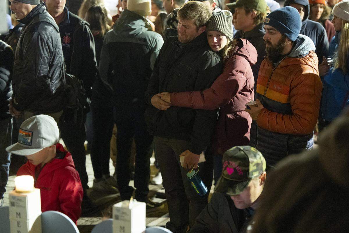 Truckee community members gather for a vigil in downtown Truckee on Sunday to remember the victims of a deadly avalanche that struck the Lake Tahoe area the previous week.
