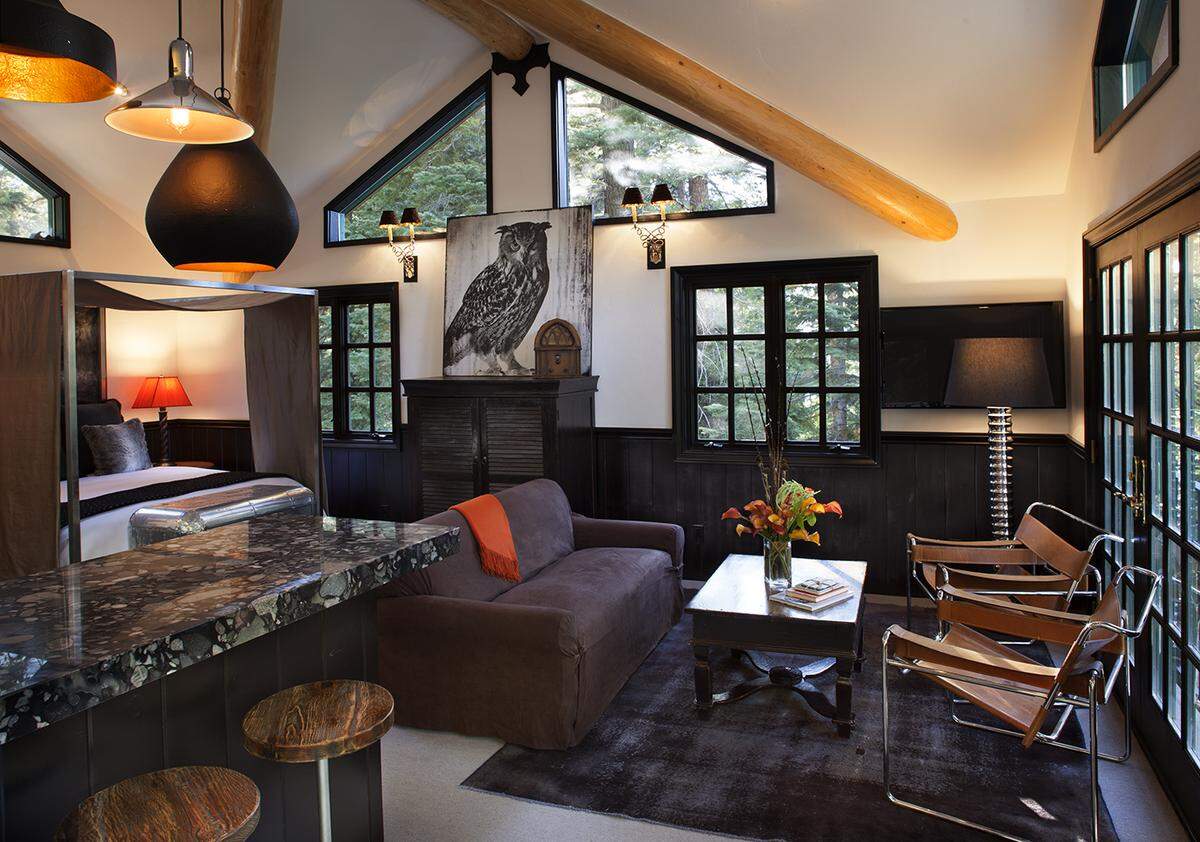 The studio called “Topside” is perched above a one-car garage.