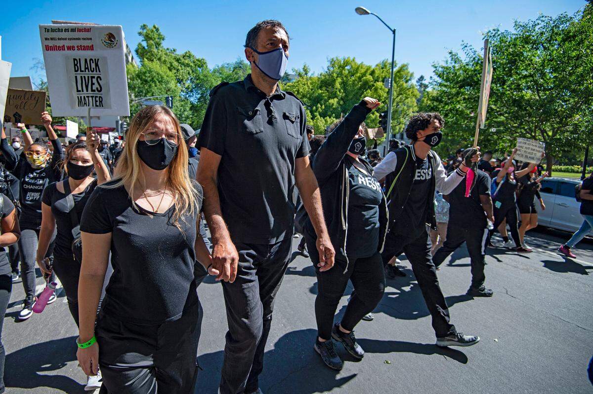 Sacramento Kings General Manager Vlade Divac marches with demonstrators from Golden 1 Center to the state Capitol in Sacramento on Saturday, June 6, 2020, to protest the killing of George Floyd.