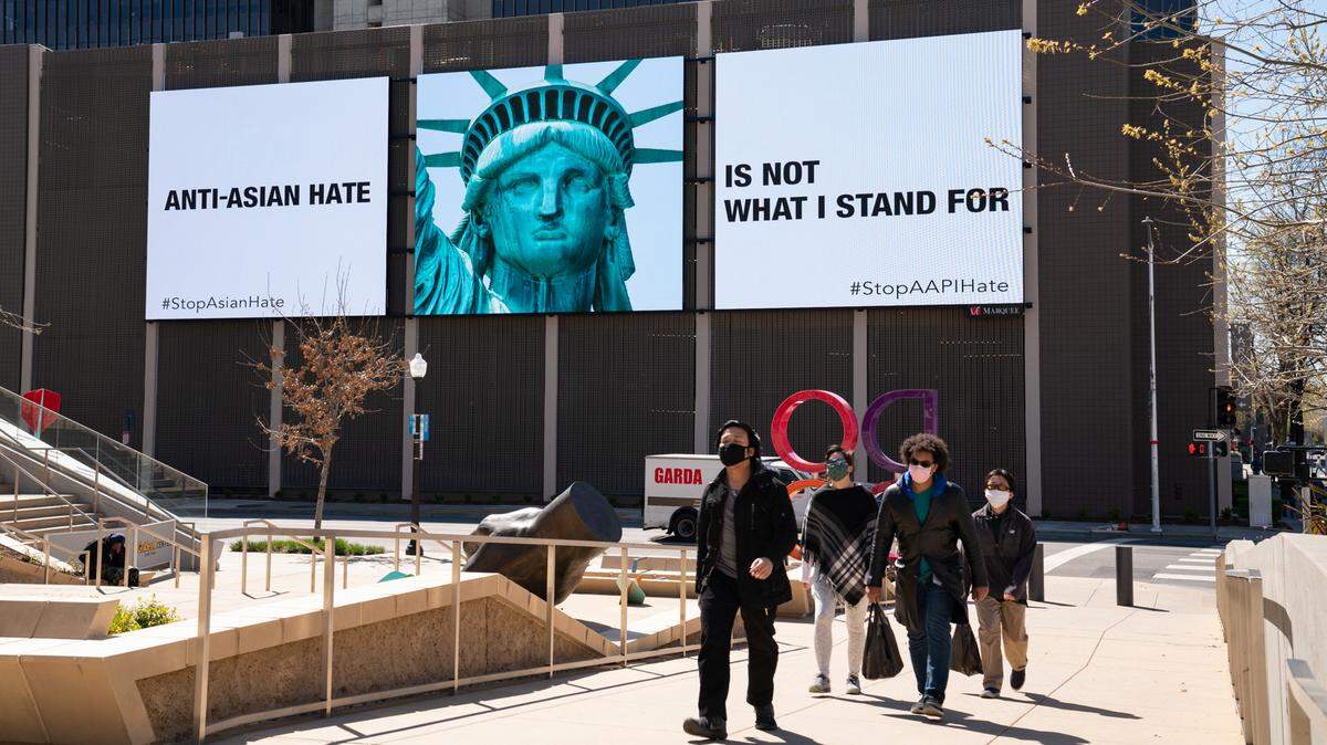 Sacramento-raised artist Bob Matsumoto’s “Stop Asian Hate” digital billboard is projected onto screen near Golden 1 Center. Matsumoto’s billboards have been projected in 13 different locations across California.