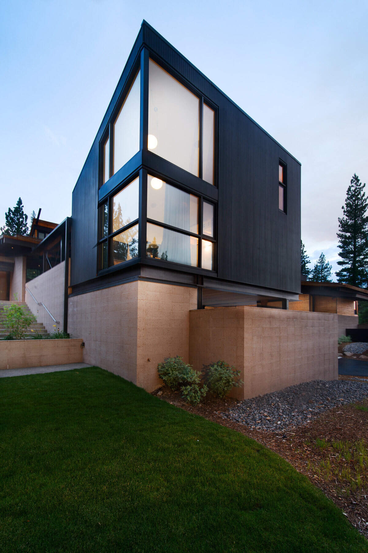 A separate wing includes four additional bedrooms, plus a media and game lounge intended as an at-home retreat after days on the slopes, trails or golf course.