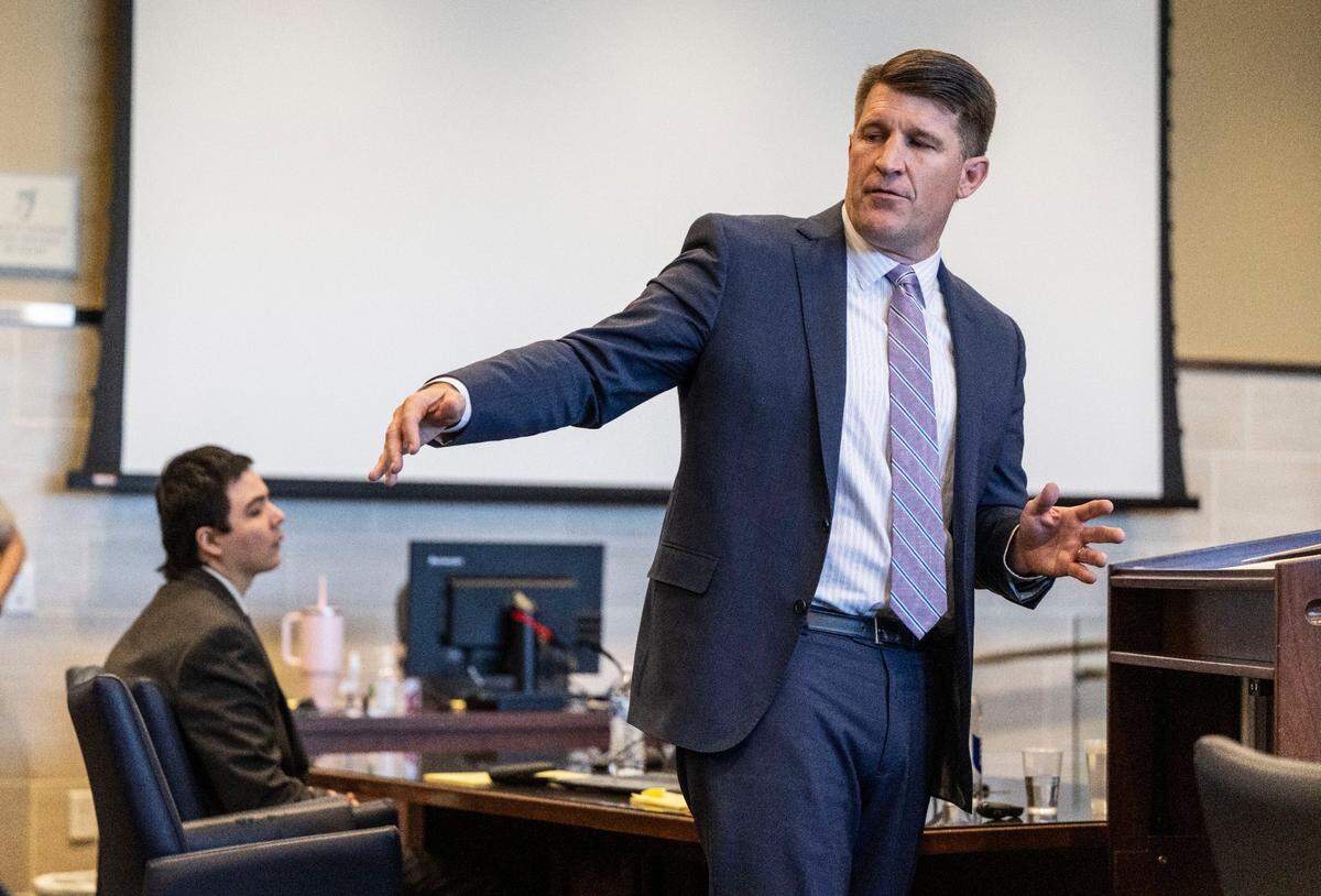 Yolo County deputy public defender Daniel Hutchinson gives his opening statement in Yolo County Superior Court in Woodland on Monday, May 5, 2025, in the trial of Carlos Reales Dominguez, left, for a series of stabbings in Davis in 2023.