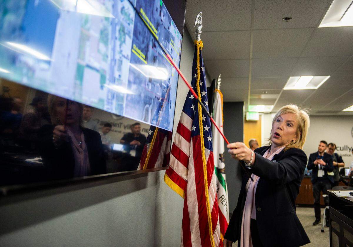District Attorney Anne Marie Schubert points at a map of the scene of the Stephon Clark shooting at a press conference in 2019. Schubert declared that the Sacramento Police officers had “acted lawfully under the circumstances” in the March 2018 shooting and that her office would not press charges against them.