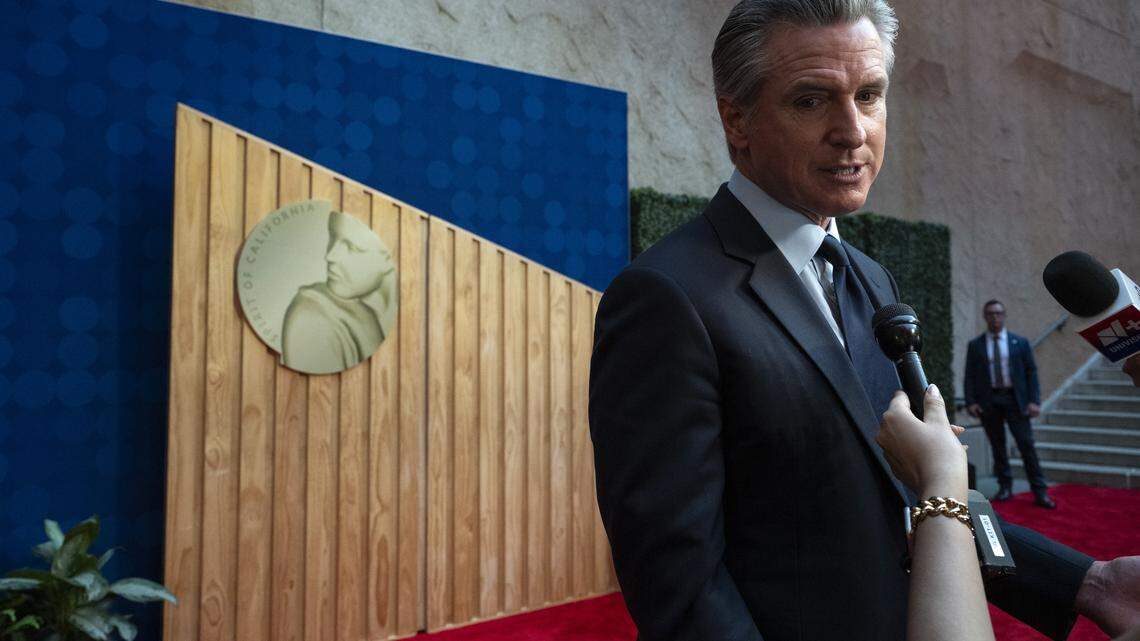 Gov. Gavin Newsom answers questions from the media on the red carpet before an induction ceremony of the 19th class of California Hall of Fame inductees at the California Museum in Sacramento on Thursday, March 19, 2026.
