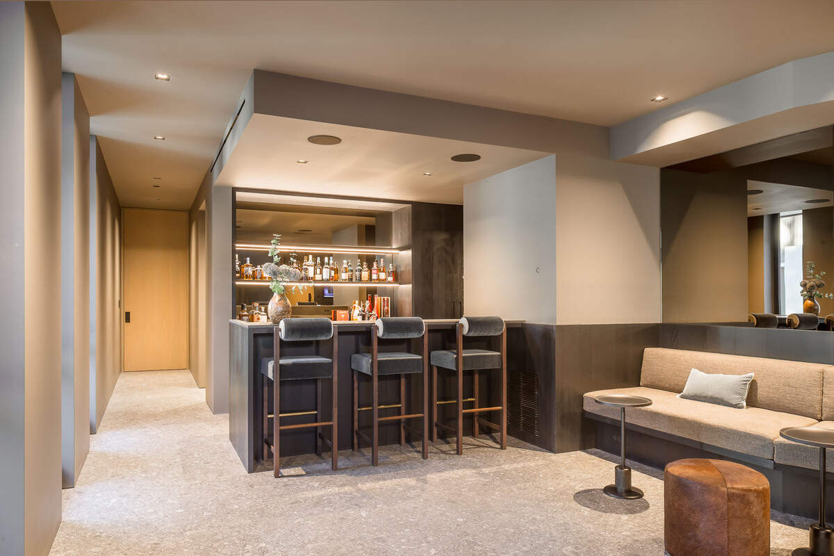 The bar is part of the home’s entertainment amenities.