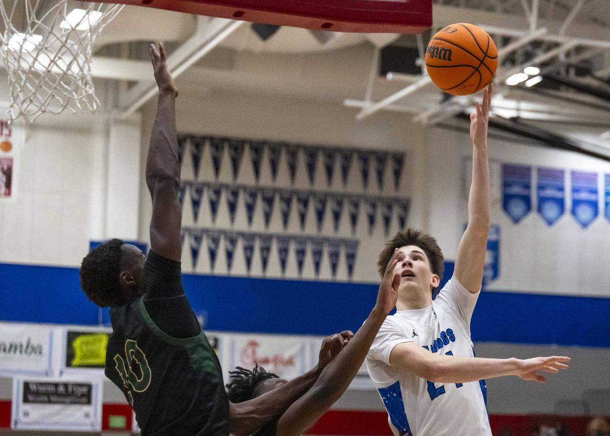 The Folsom Bulldogs’ Parks Weaver shoots a lay up during a boys basketball game in January 2025 against Monterey Trail. Weaver on Friday scored all 7 of Folsom’s overtime points against McClatchy in a CIF Sac-Joaquin Section Division I quarterfinal, including the winner at the buzzer for a 65-63 win.